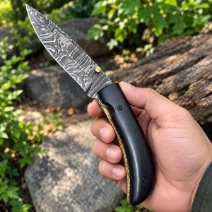 Cuchillo Plegable de Acero de Damasco de Grado Industrial Hecho a Mano con Mango de Micarta y Funda de Cuero para Acampar al Aire Libre - Product Image 1