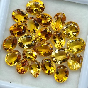 พลอยซิทรินธรรมชาติทรงรีเจียระไน 21 เม็ด สีเหลืองทอง น้ำหนัก 52.60 กะรัต สำหรับทำเครื่องประดับ - Product Image 3