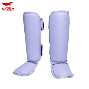 Protège-tibias réglables en cuir synthétique de haute qualité pour entraînement Muay Thai MMA avec fermeture auto-agrippante – Vente en gros - Product Image 1