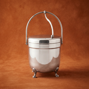 Vintage Silver Plated Ice Bucket Featuring <b>Swinging</b> <b>Top</b> Handle Hinged Retracting Lid Curved Silhouette And Detailed Claw Feet - Product Image 1