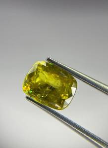 natural <b>colour</b> play faceted sphene gemstone <b>cushion</b> cut. - Product Image 1