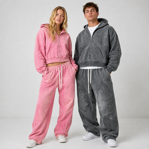 Ensemble de survêtement décontracté pour femmes avec sweat à capuche zippé gaufré et pantalon de survêtement large, style streetwear, personnalisable pour hommes et femmes - Product Image 1