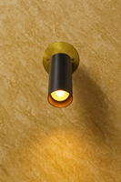 Applique murale moderne réglable, base cylindrique en laiton noir, luminaire spot en métal poli