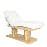 Lit médical électrique au design moderne avec éclairage et chauffage, table de massage en bois pour spa facial et salon de beauté, idéal pour salon ou hôtel