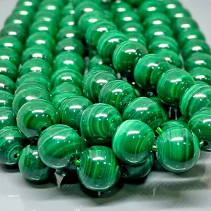 Perles de malachite verte naturelle de 8 mm, lisses et rondes, qualité AAA, brin de 15 pouces - Product Image 1