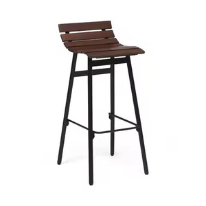 Tabouret et chaise de bar en bois foncé avec base en fer noir, pour usage industriel en coin de café. - Product Image 1