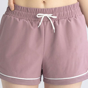 Jupe-short décontractée taille haute pour femme en mélange polyester/coton tricoté, teinte unie, avec poches et taille élastique, respirante - Product Image 1