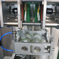 Machine de remplissage automatique de sachets de poudre cosmétique de forme irrégulière, contrôlée par PLC, petite machine d'emballage verticale pour aliments et boissons