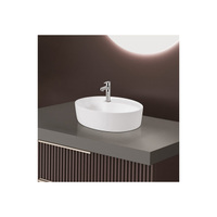 Vasque rectangulaire en céramique blanche moderne à poser sur comptoir, très demandée pour les salles de bain d'hôpitaux