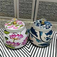 Pot de rangement en métal blanc de style nordique |   Pot à fruits et en-cas à motifs floraux roses |   Pot de rangement pour bonbons avec couvercle en verre orné d'éléments dorés