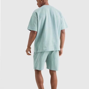 ชุดเซ็ตฤดูร้อนปี 2026 แบบยูนิเซ็กซ์ เรียบง่าย สองชิ้น เสื้อคอกลมทรงหลวม กางเกงขาสั้นเอวยางยืดพร้อมเชือกผูก - Product Image 4