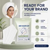 Bonnet de séchage des cheveux jetable OEM ODM en fibre de coton végétal doux, absorbant rapidement l'eau, idéal pour les voyages et les hôtels