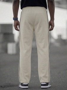 Nouveau pantalon de survêtement décontracté pour homme, beige, taille élastique, bande latérale, 100 % coton, respirant, tricoté, léger, moderne, pour l'automne - Product Image 3