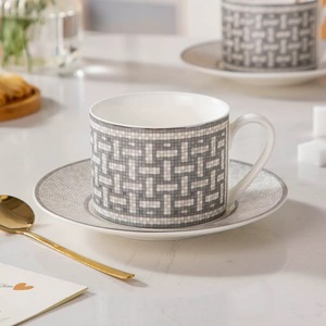 European style woven stripe pattern minimalist ceramic coffee <b>tea</b> <b>cup</b> and <b>saucer</b> set for home and afternoon <b>tea</b> - Product Image 1