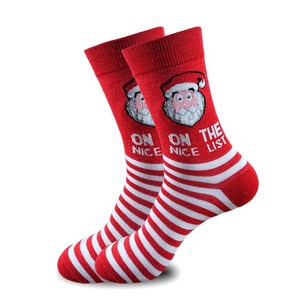 Chaussettes mi-mollet à thème de Noël, unisexes, avec des motifs de Père Noël, de rennes et des décorations festives - Product Image 2