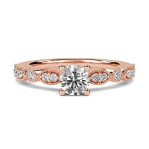 แหวนหมั้นเพชรทรงกลม Infinity Twist น้ำหนัก 0.50 กะรัต เพชรเพาะเลี้ยงในห้องปฏิบัติการ ตัวเรือนทอง 18K และแพลตตินัม - Product Image 1