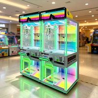 Promotion : Machine de grue automatique à pince avec logo personnalisé pour salles d'arcade et centres commerciaux, alimentation 110/220V et jetons personnalisables
