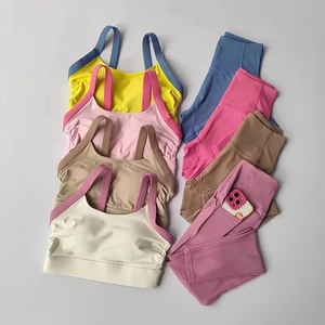 Shorts de sport et yoga sans coutures respirants pour femmes, couleur unie, taille élastique, poche latérale, style cycliste, séchage rapide - Product Image 1