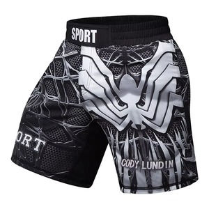 Shorts MMA professionnels pour hommes, logo personnalisé sur le devant, polyester sublimé, séchage rapide, vêtements de sport pour la salle de sport, l'entraînement et les combats - Product Image 1