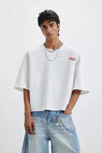 เสื้อยืดโอเวอร์ไซส์สีขาวแขนสั้นสำหรับผู้ชาย ONETEN APPAREL ผ้าคอตตอนเจอร์ซีย์ ทรงโอ-เนค ระบายอากาศได้ดี สไตล์สตรีทลำลอง น้ำหนัก 320 กรัม - Product Image 3