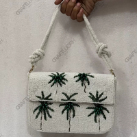 Pochette d'épaule artisanale perlée ivoire avec broderie palmier et motifs, fermeture éclair, bandoulière unique, sac de villégiature OEM personnalisable