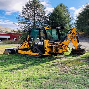 Chargeuse compacte JCB 1CXT durable avec moteur 50HP 60KW et pompe hydraulique pour les opérations agricoles et de construction intensives - Product Image 1