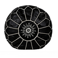 Pouf ottoman rond en cuir véritable fait main marocain Biyadina Store, repose-pieds noir pour chambre à coucher, chaise pouf de style transitionnel