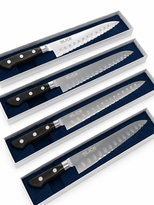 Cuchillo de chef de acero inoxidable Seki Japan con mango de plástico, borde serrado, diseño ambidiestro y hoja con diseño de hoyuelos. - Product Image 1