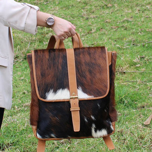 Premium cowhide leather hair on student <b>backpacks</b> wholesale supplier OEM custom handmade export quality leather school bags - Product Image 6