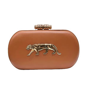 Pochette à cadre lisse couleur tan avec emblème de tigre en métal, sac de soirée de luxe moderne, accessoire de mode affirmé - Product Image 1