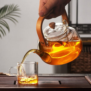 Tetera de Vidrio Resistente al Calor de 1000 ml, Tetera de Borosilicato con Asa de Bambú, Jarra Transparente para Servir Té, para el Hogar, la Oficina o Fiestas - Product Image 1