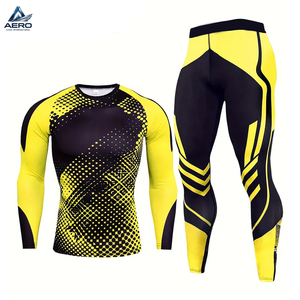 Vêtements de compression pour hommes de Good Supplier, comprenant une chemise à manches longues et col rond extensible et à séchage rapide, et un pantalon long. - Product Image 1