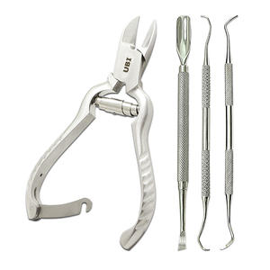 Kit de manucure et pédicure durable en acier inoxydable 4-en-1 : Coupe-ongles double face, repousse-cuticules et outils pour soins des ongles des mains et des pieds - Product Image 1