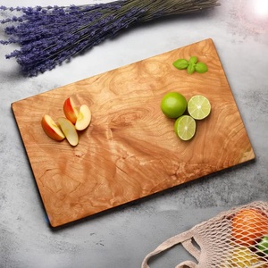 Planche à découper élégante avec grande poignée centrale, bords arrondis lisses, surface compatible couteaux, idéale pour couper et présenter - Product Image 5