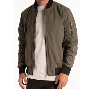 olive-green cotton bomber <b>jacket</b> features a classic black ribbed collar and a convenient utility <b>zipper</b> <b>pocket</b> on the left - Product Image 3
