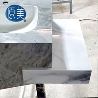 Lavabo moderne bicolore en céramique sans couture Petit marbre en relief Coiffeuse murale innovante pour hôtels pour salles de bains