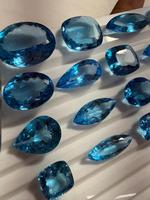 Lot de topazes bleues suisses ovales et taille coussin facettées pour la fabrication de bijoux chez BU GEMS, 100 % naturelles, certifiées par un tiers