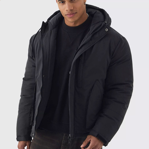 Blouson d'hiver mat noir minimaliste pour homme, matelassé, isolé, coupe-vent, chaud, avec patchwork de fourrure, pour l'extérieur par temps froid, en laine - Product Image 1