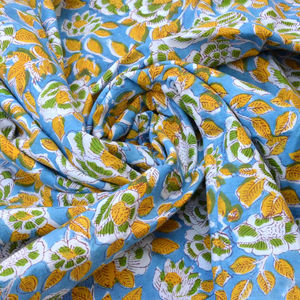Tissu floral 100% coton imprimé à la main style Jaipuri, base bleue, doux et respirant, pour vêtements et ameublement. - Product Image 1