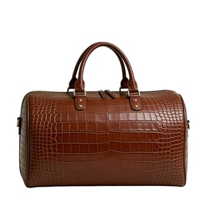 OEM ODM Custom Embossed Grain PU Leather Duffle Bag Textured Surface Travel Custom Logo - Product Image 1