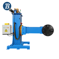 Positionneur de soudage robotisé en forme de L avec tourelle et contre-tourelle industrielles, table de positionnement rotative automatisée