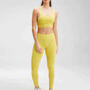 Ensemble de sport pour femme : Soutien-gorge de sport dos nageur jaune et leggings taille haute pour le yoga et l'entraînement, sans coutures, maintien moyen, en Spandex et Polyester - Product Image 1