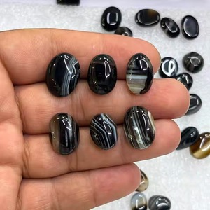 พลอยอาเกตสีดำลายเส้นธรรมชาติทรงรีขัดเงาแบบคาโบชอง เป็นมิตรต่อสิ่งแวดล้อม สำหรับทำแหวน จี้ และเครื่องประดับ ขายส่ง - Product Image 2