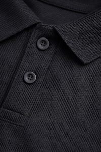 Polo de poliéster y algodón con corte ajustado, características de ventilación avanzadas, tela absorbente de sudor y calidad textil de alta densidad - Product Image 1