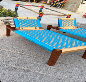 Ornate wooden charpai <b>bench</b> with a vibrant yellow and blue geometric woven rope design, available at wholesale prices. - Product Image 5