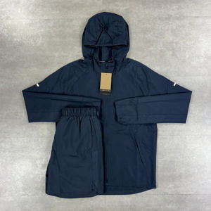 Conjunto Deportivo de Dos Piezas Personalizado para Hombre, Chaqueta Cortavientos de Nailon y Poliéster para Verano con Capucha y Pantalón con Cintura Elástica - Product Image 1