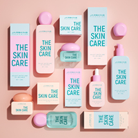 Nouvel Ensemble d'Emballages Cosmétiques en Verre Rose : Bouteilles et Pots Carrés Plats Vides Personnalisés pour Soins de la Peau en Gros