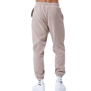Pantalon de jogging mi-saison en maille beige pour homme avec taille élastique et poches latérales, style décontracté 2027 - Product Image 1