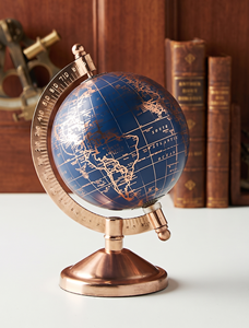 Globe terrestre décoratif nautique de luxe en or rose métallisé et bleu marine pour bureau de direction, bibliothèque et salon - Product Image 1