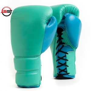 Gants de boxe de protection fabriqués avec un matériau durable, offrant un ajustement confortable, une prise sécurisée et idéaux pour la boxe - Product Image 1